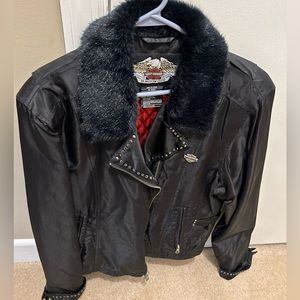Harley Davidson jacket with fur neck accent.